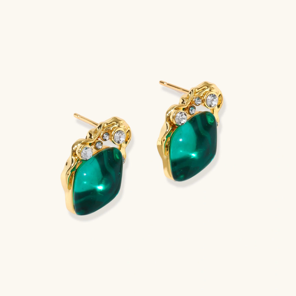 Gold-plated stud earrings featuring teardrop emerald green liuli stones with cubic zirconia crystal accents on white background.